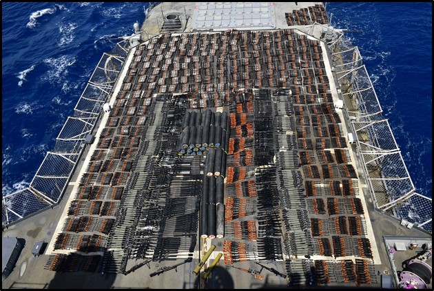 Thousands of illicit weapons laid out on the USS Monterey