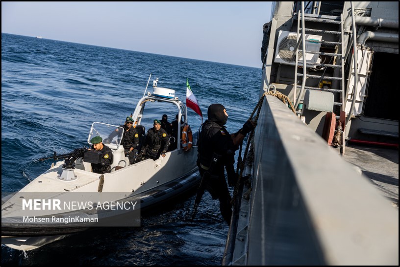 Iranian sailors board a ship during a 2023 exercise